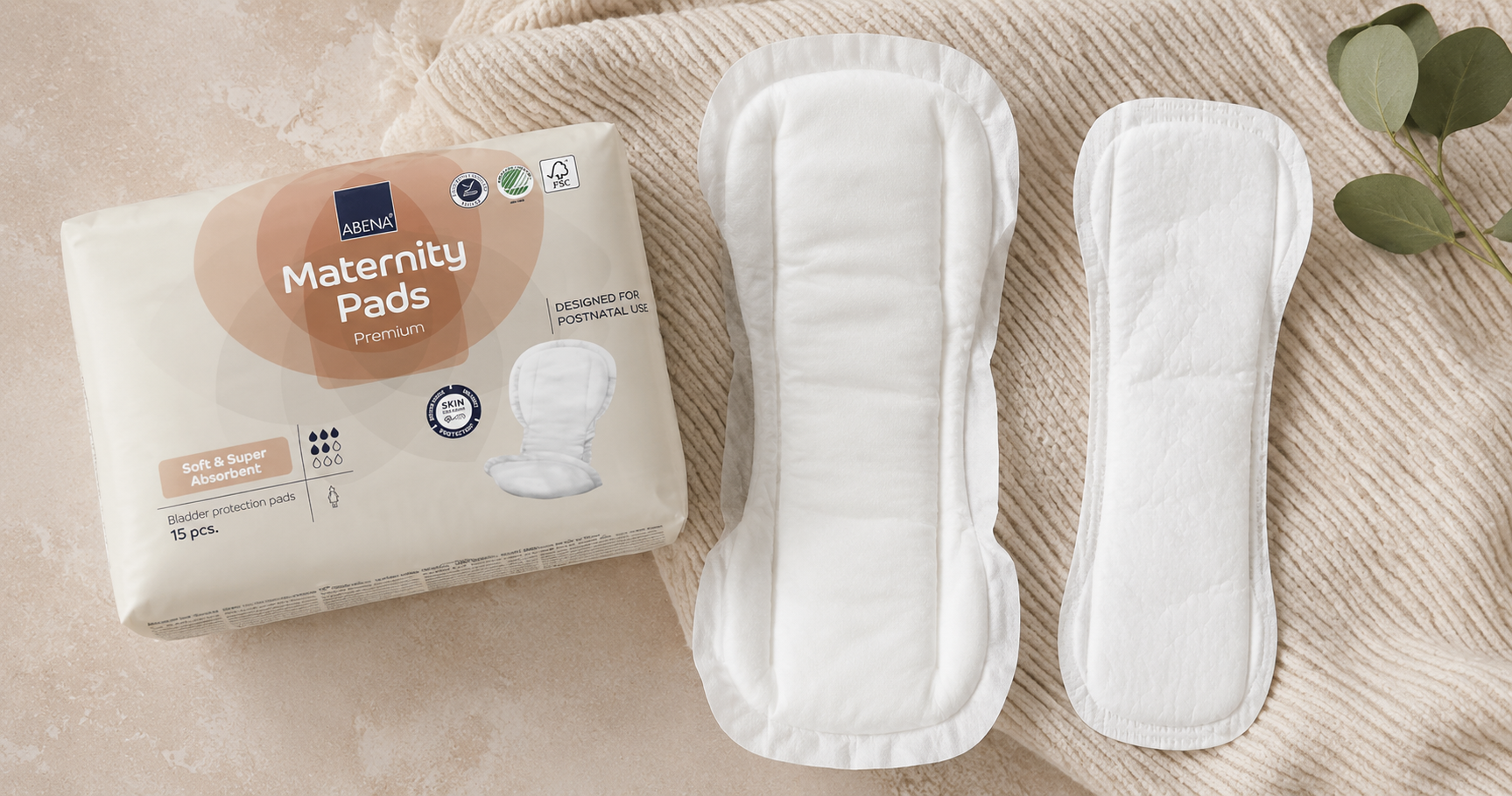 Close-up of an Abena maternity pad showing its soft thick layers